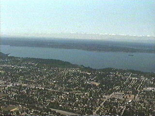 Flying over Puget Sound south from Seattle Washington