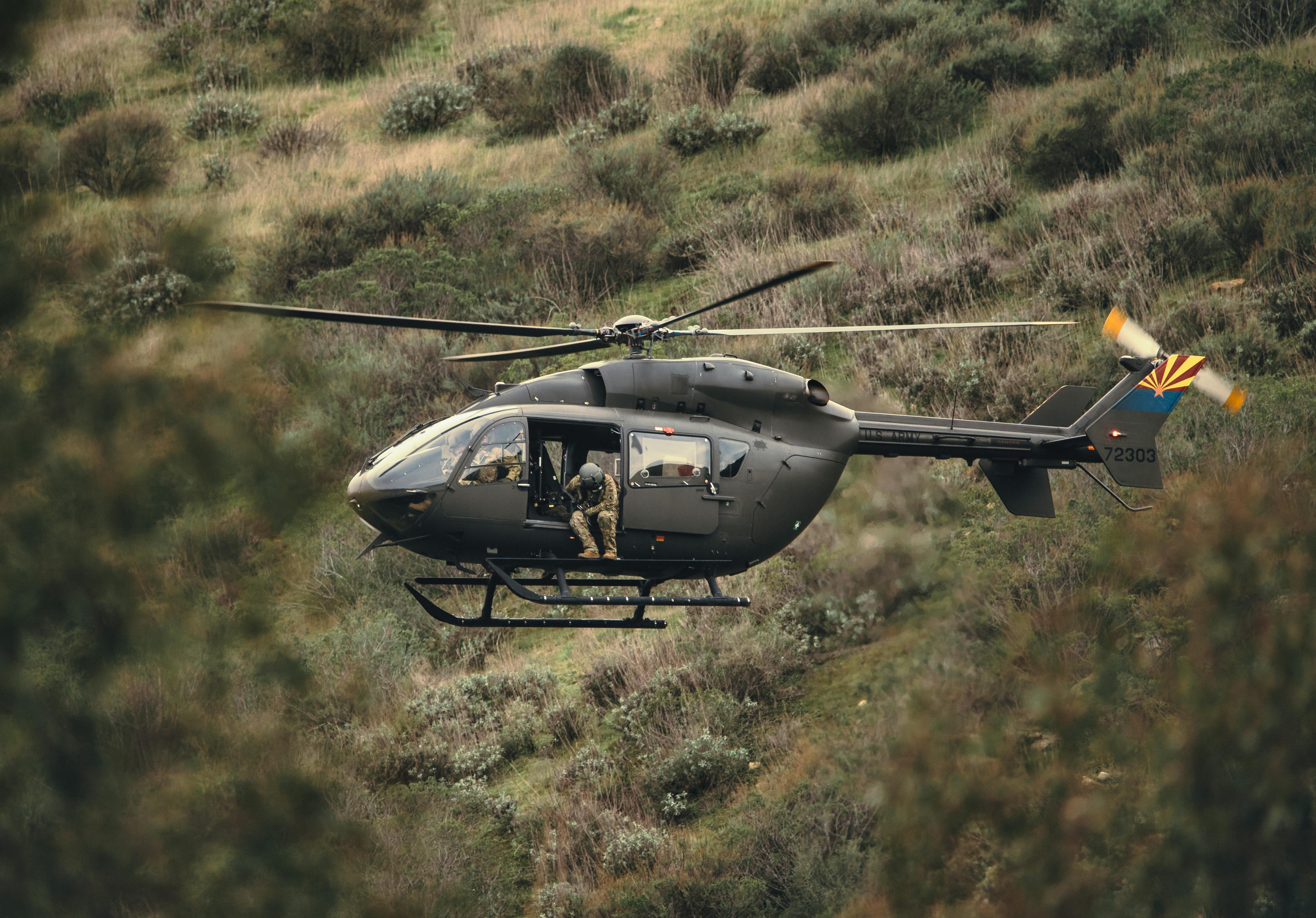 soldiers in helicopter