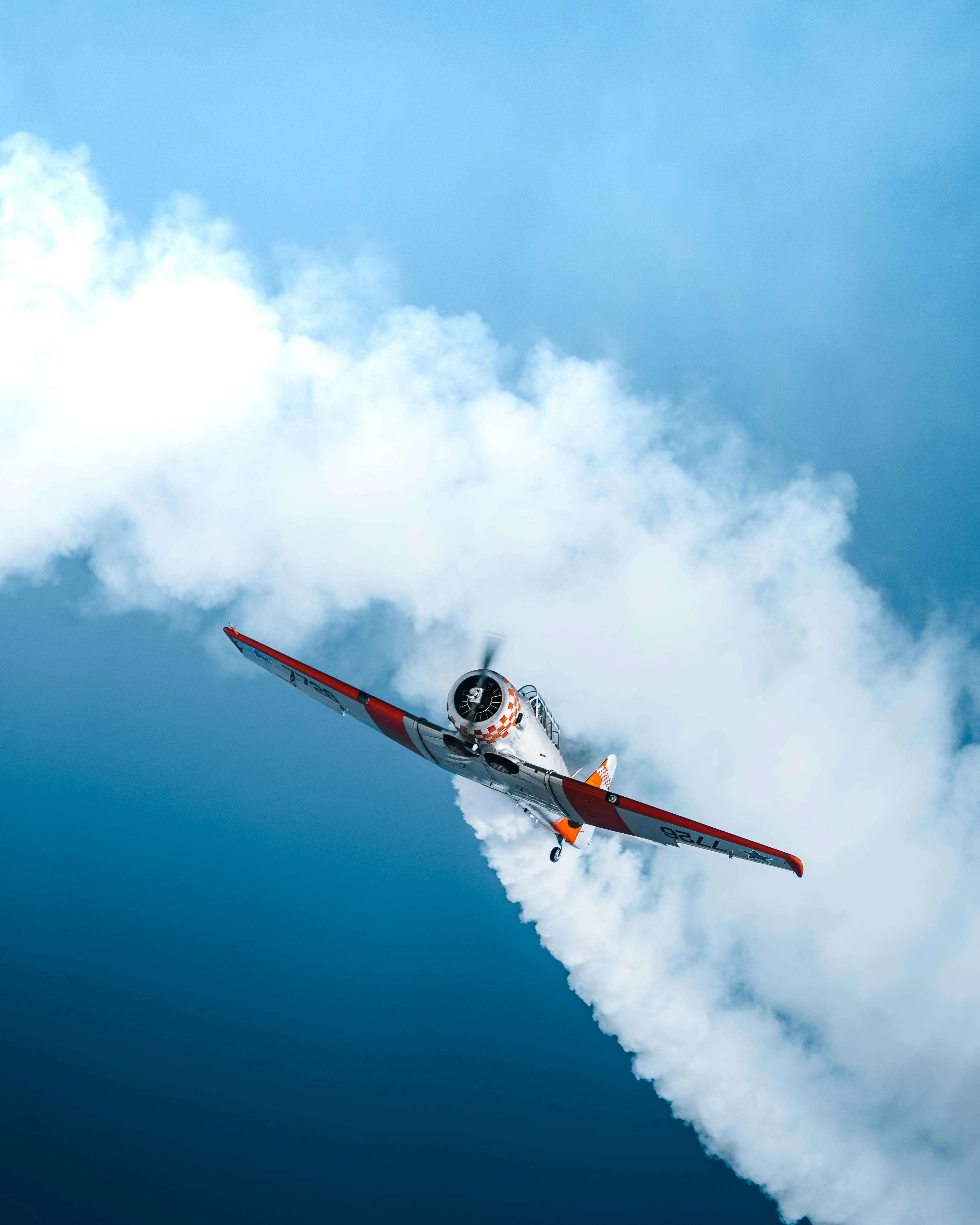 plane flying on the background of blue sky