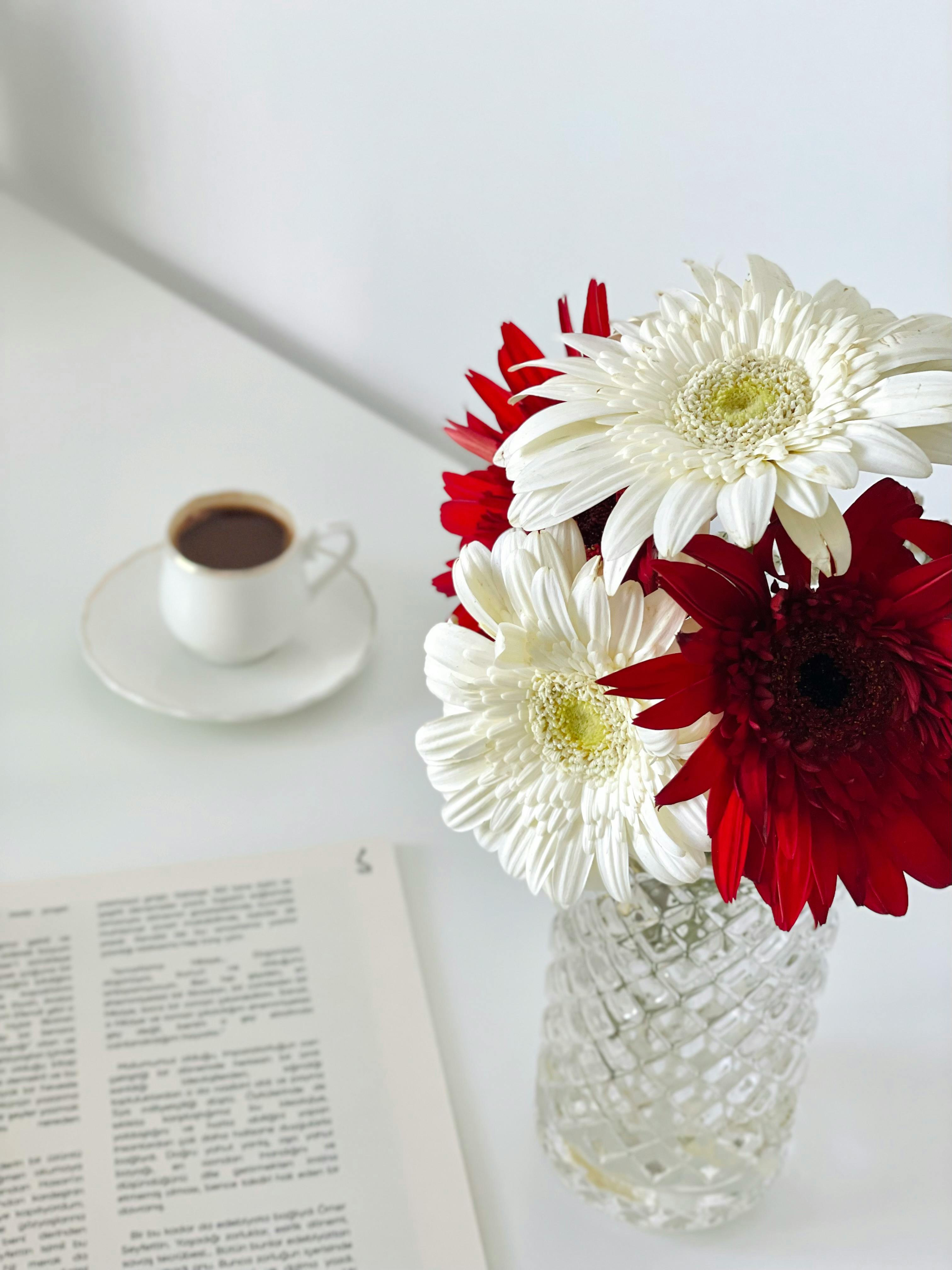 elegant floral arrangement with coffee and book
