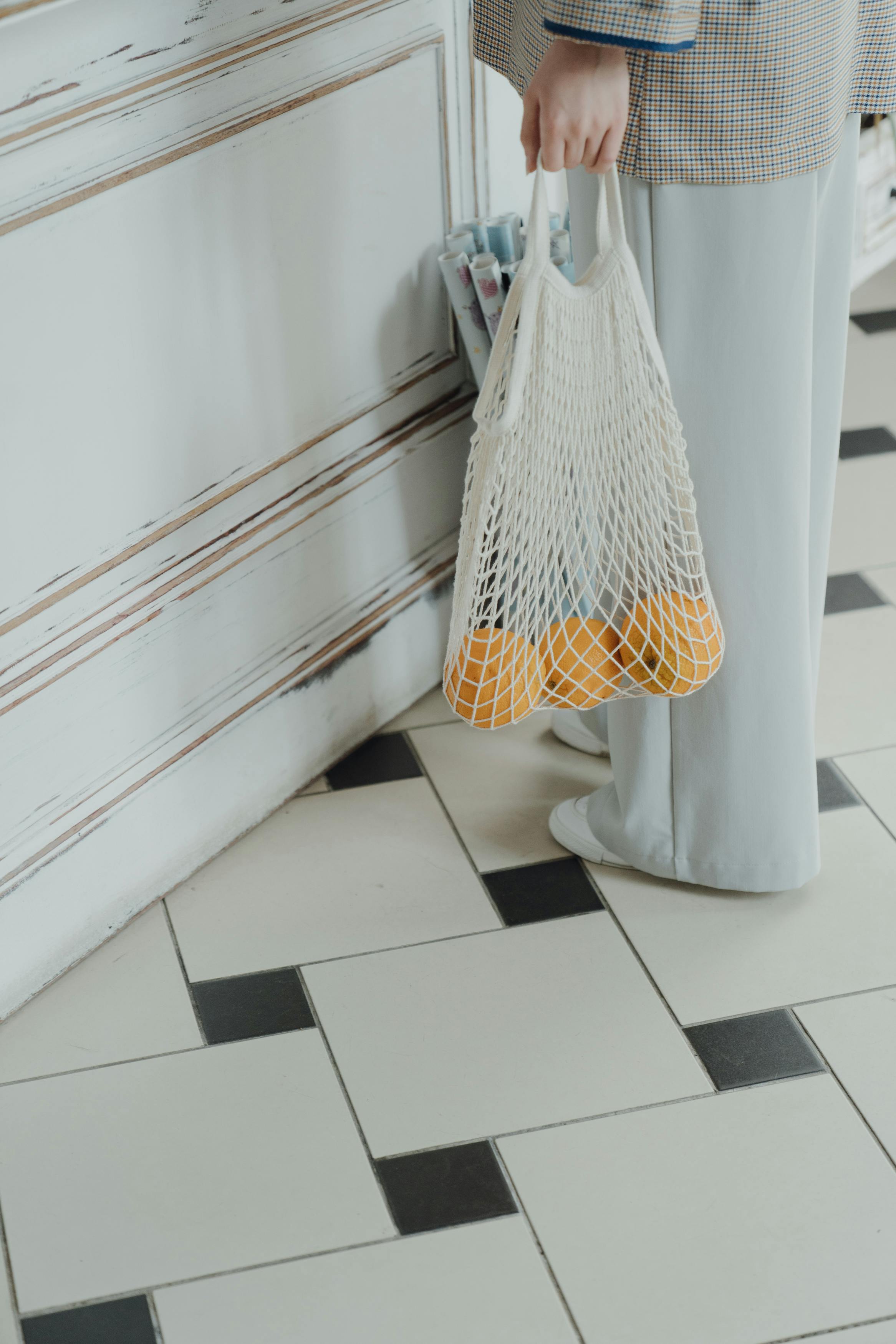 white and yellow textile hanging on white wooden door