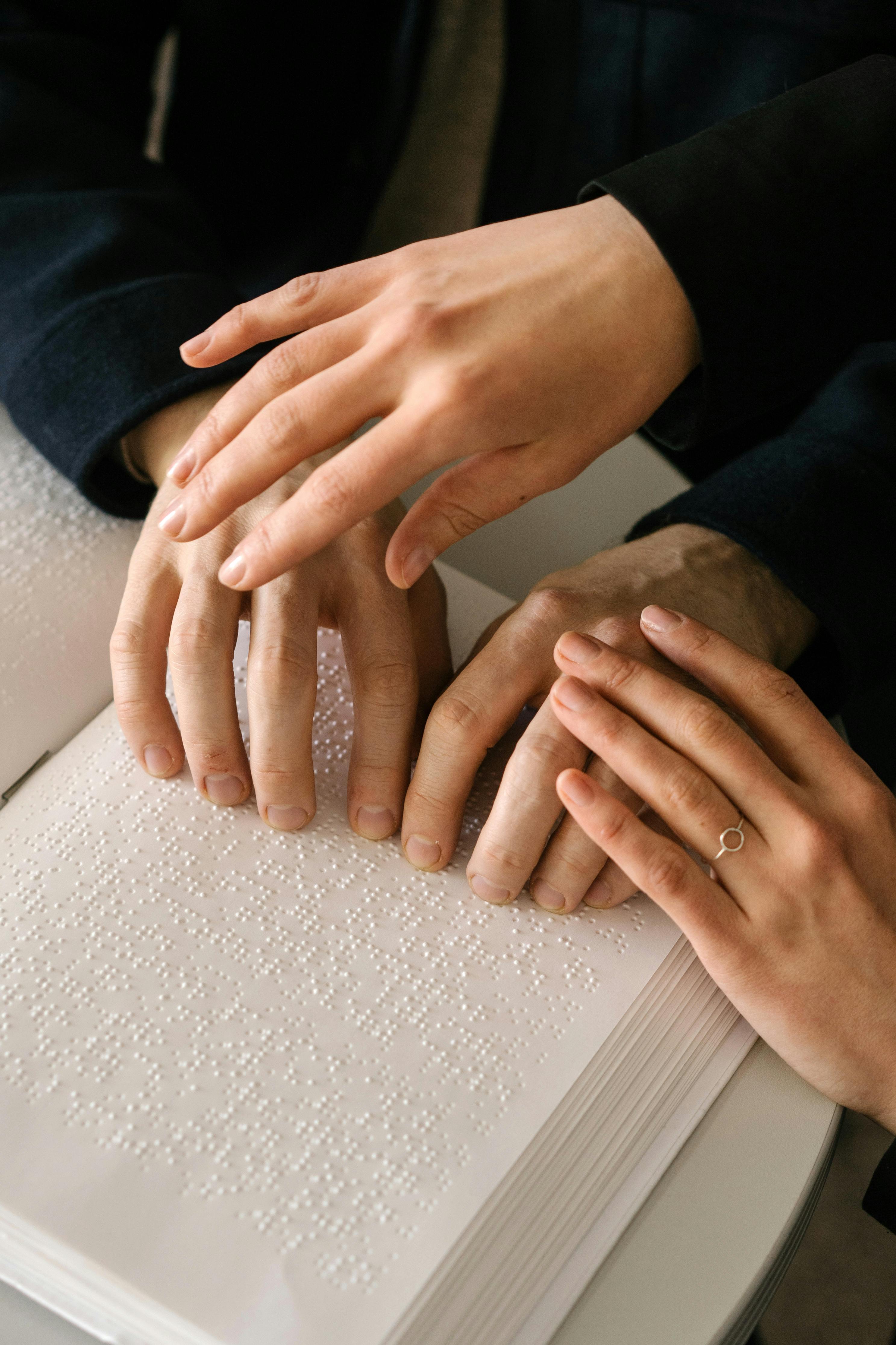 photo of person using braille