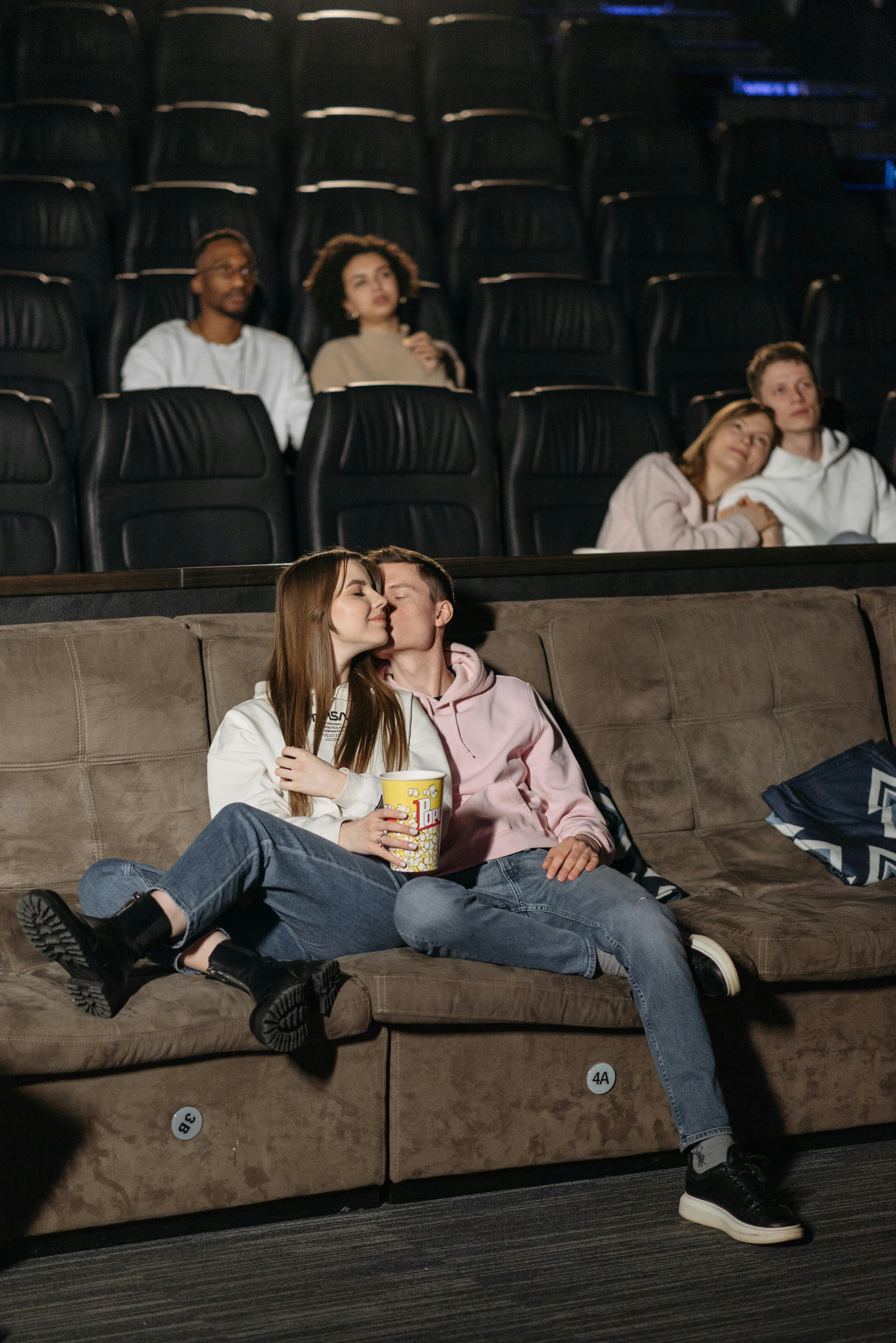 people sitting inside a cinema